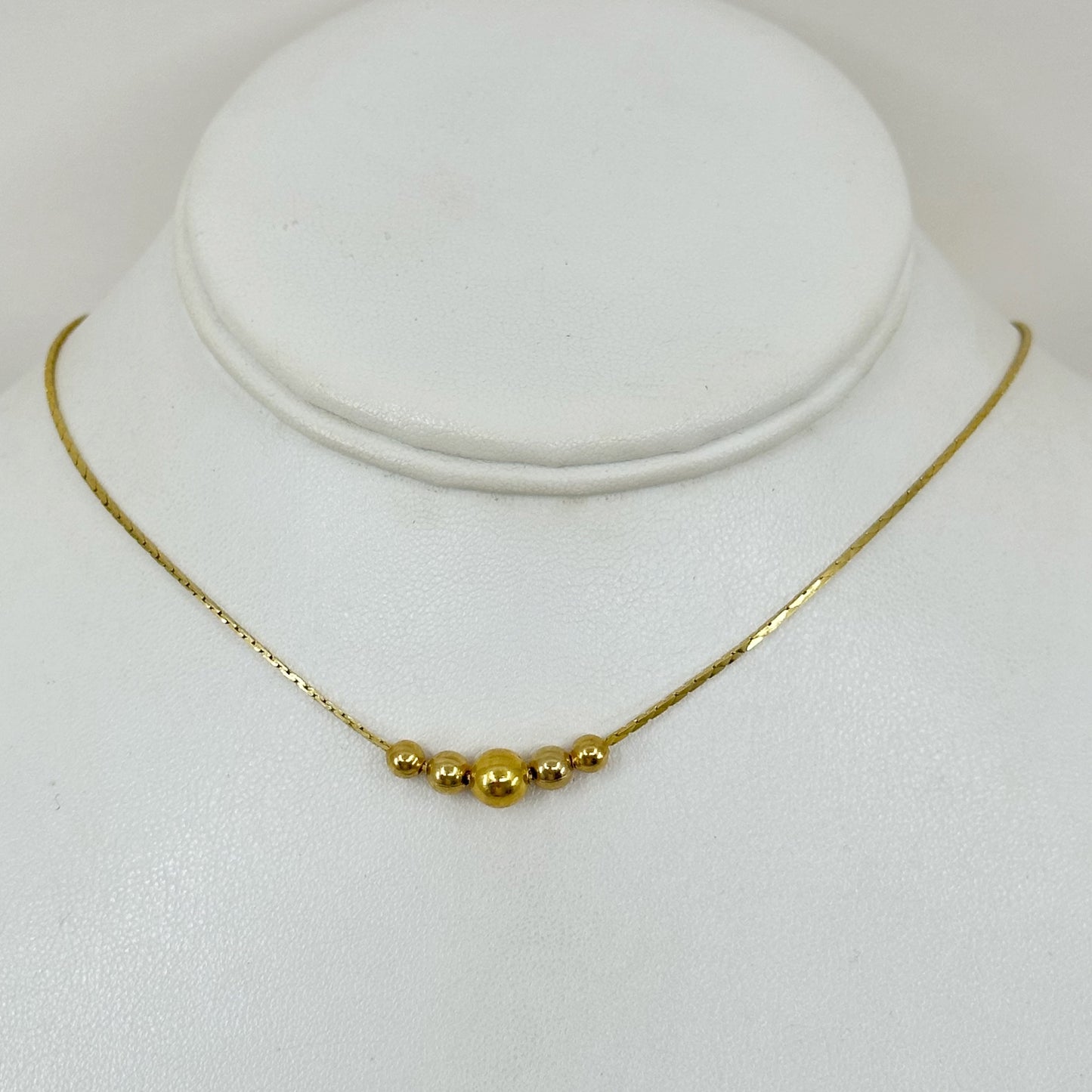 Gold tone graduated bead choker Necklace