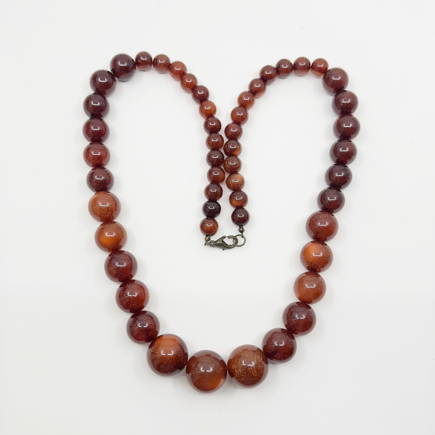 Vintage graduated amber moonglow lucite bead necklace