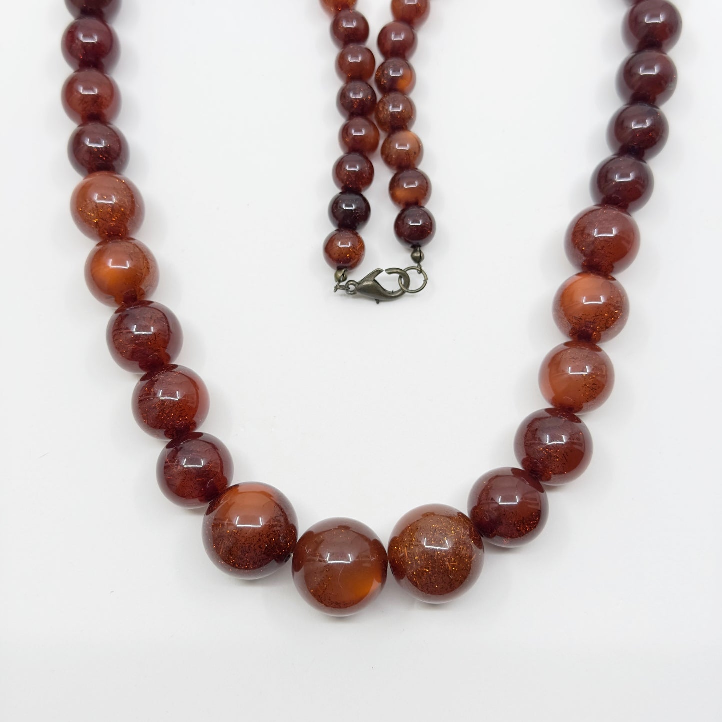 Vintage graduated amber moonglow lucite bead necklace
