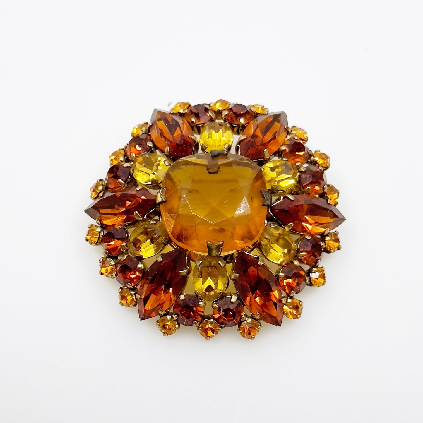 Vintage Made In Austria gold tone amber crystal brooch