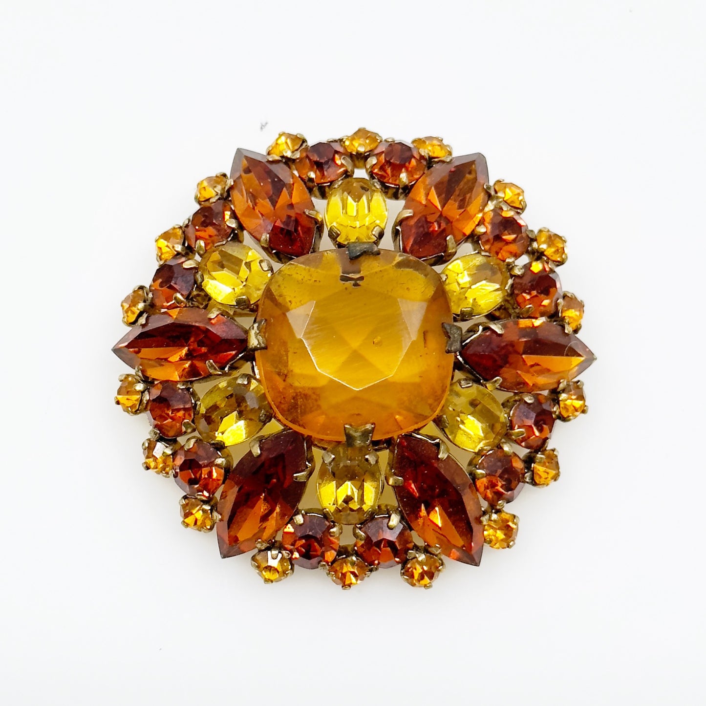 Vintage Made In Austria gold tone amber crystal brooch