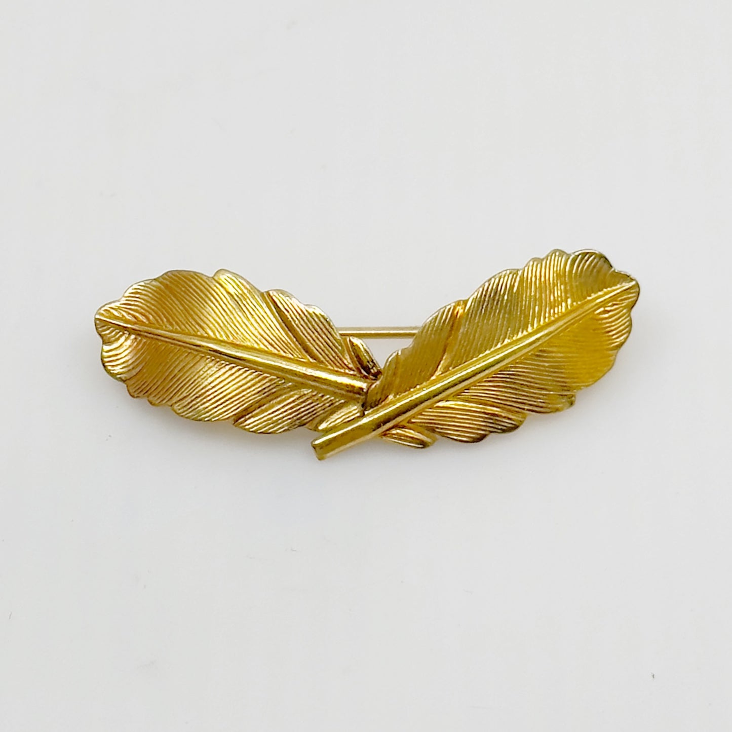 Vintage Carl Art 12K Gold Filled double feather brooch
