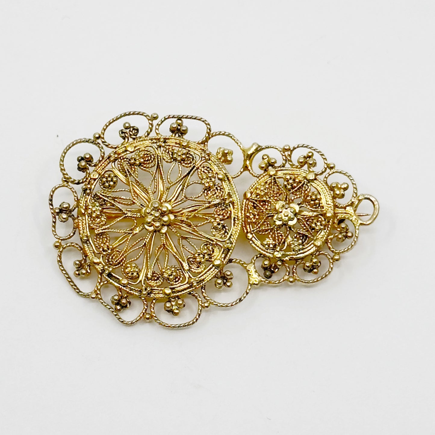 Gold over sterling silver filigree brooch