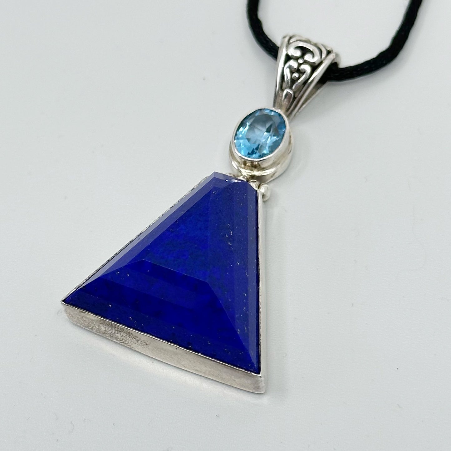 Sterling silver lapis lazuli & blue topaz pendant