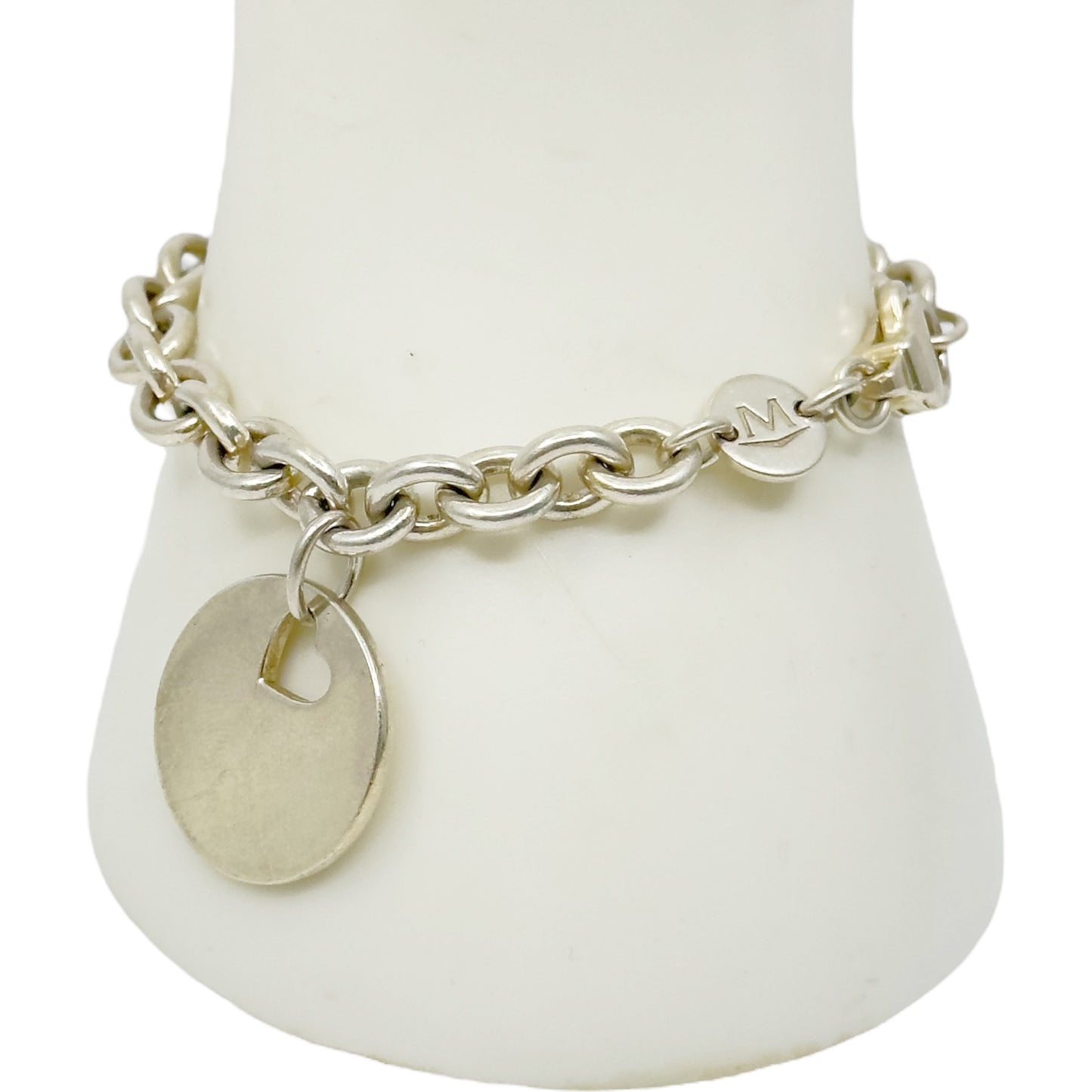 Movado sterling silver Heart Tag charm bracelet