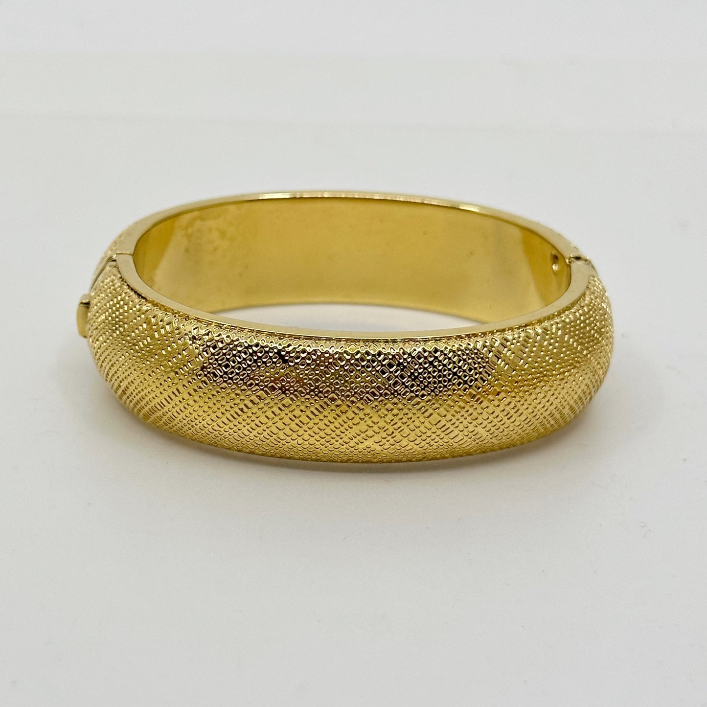 Vintage Monet Gold tone hinged bangle bracelet