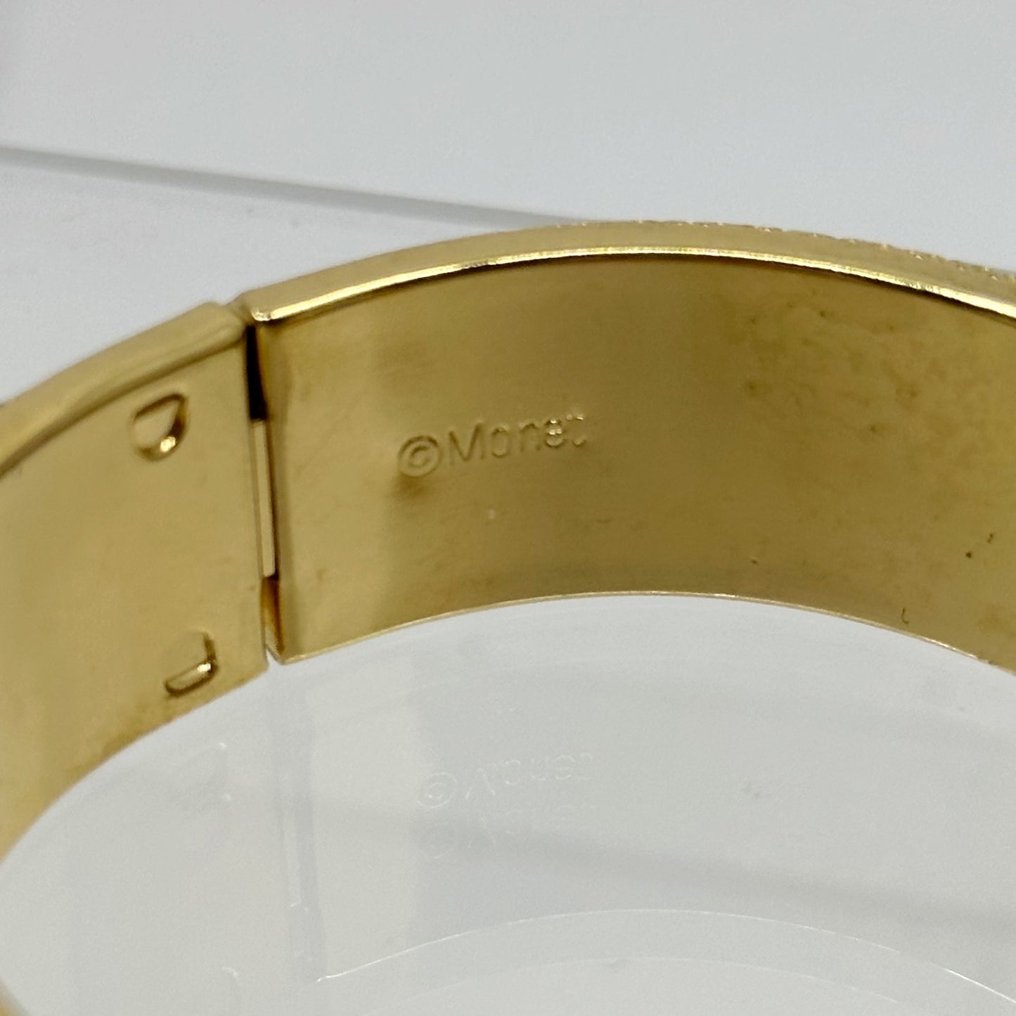 Vintage Monet Gold tone hinged bangle bracelet