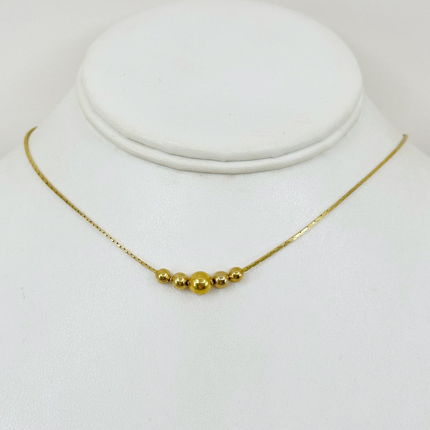 Gold tone graduated bead choker Necklace