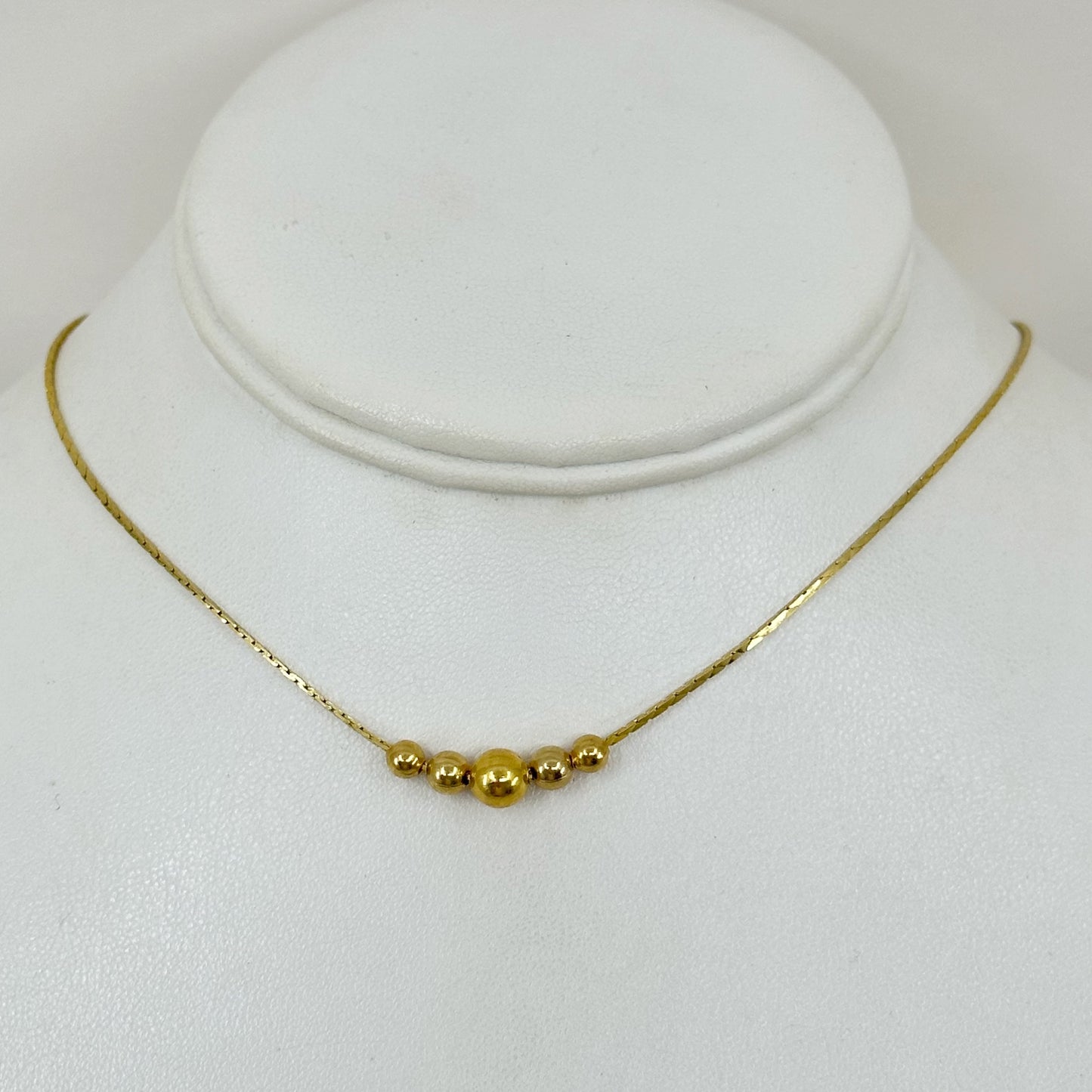 Gold tone graduated bead choker Necklace