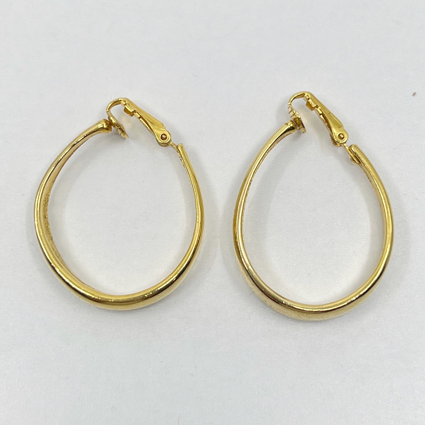 Vintage gold tone clip on hoop earrings