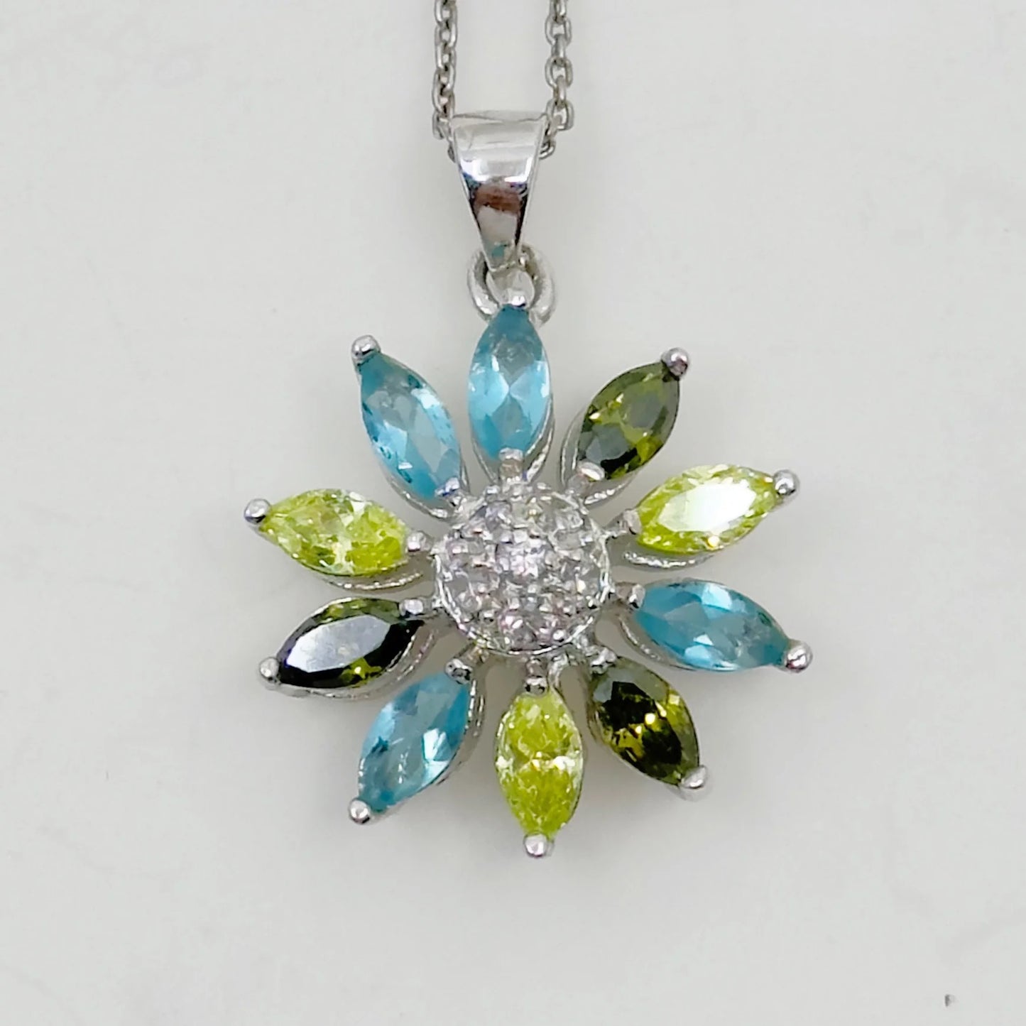 Silver plated cubic zirconia flower pendant