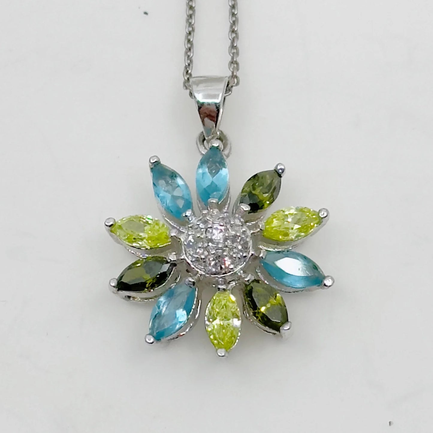 Silver plated cubic zirconia flower pendant