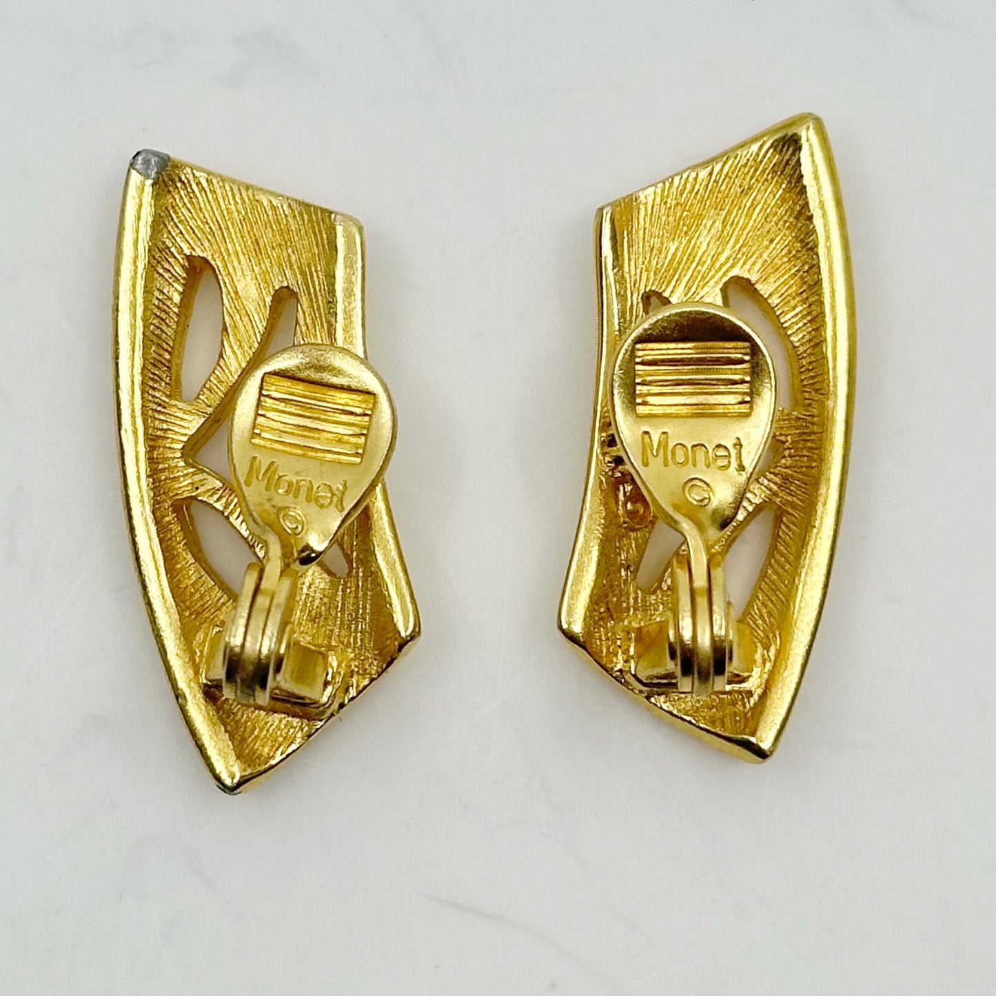 Monet gold tone clip on earrings