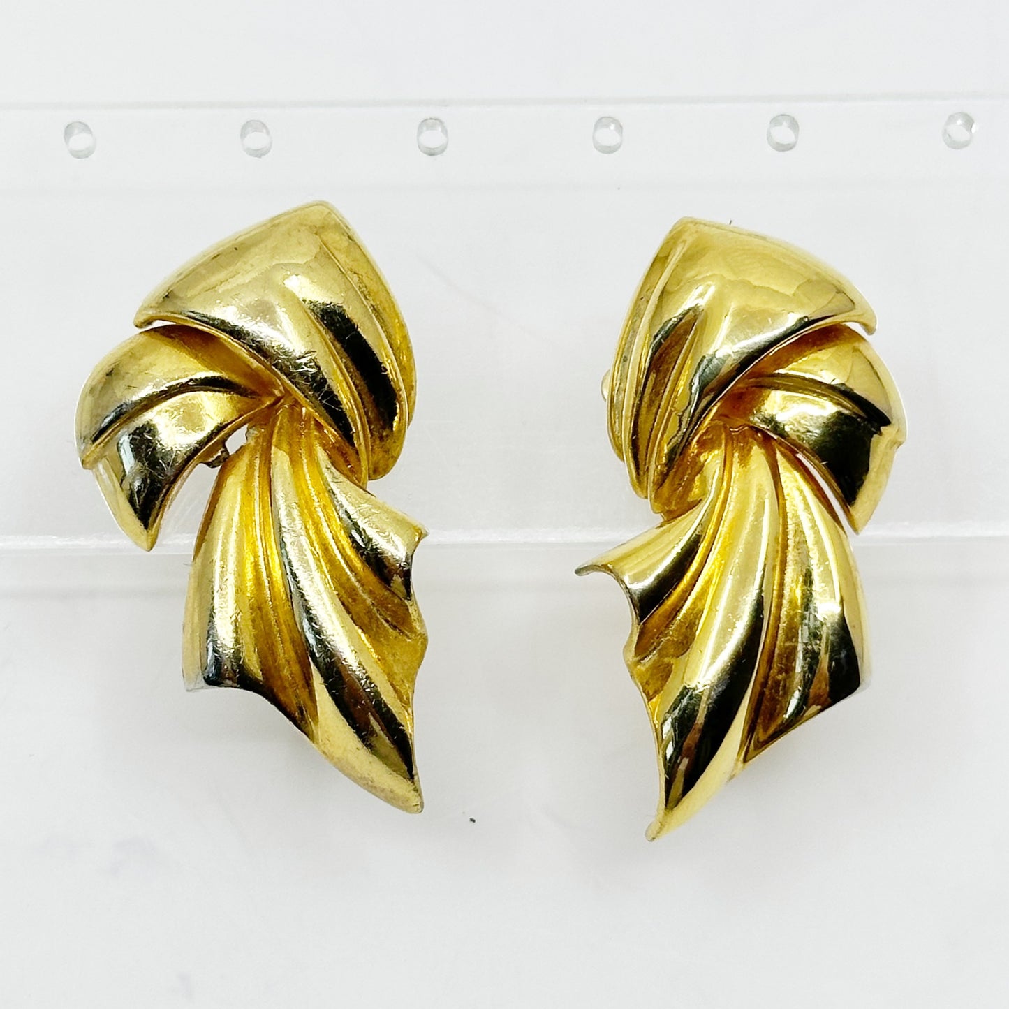 Piscitelli Gold tone Draped Knotted Scarf clip on Earrings