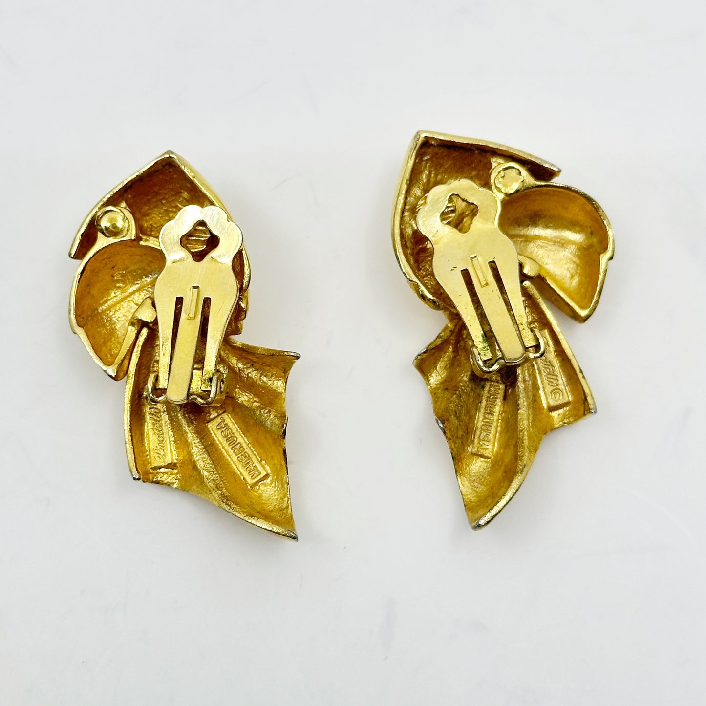 Piscitelli Gold tone Draped Knotted Scarf clip on Earrings