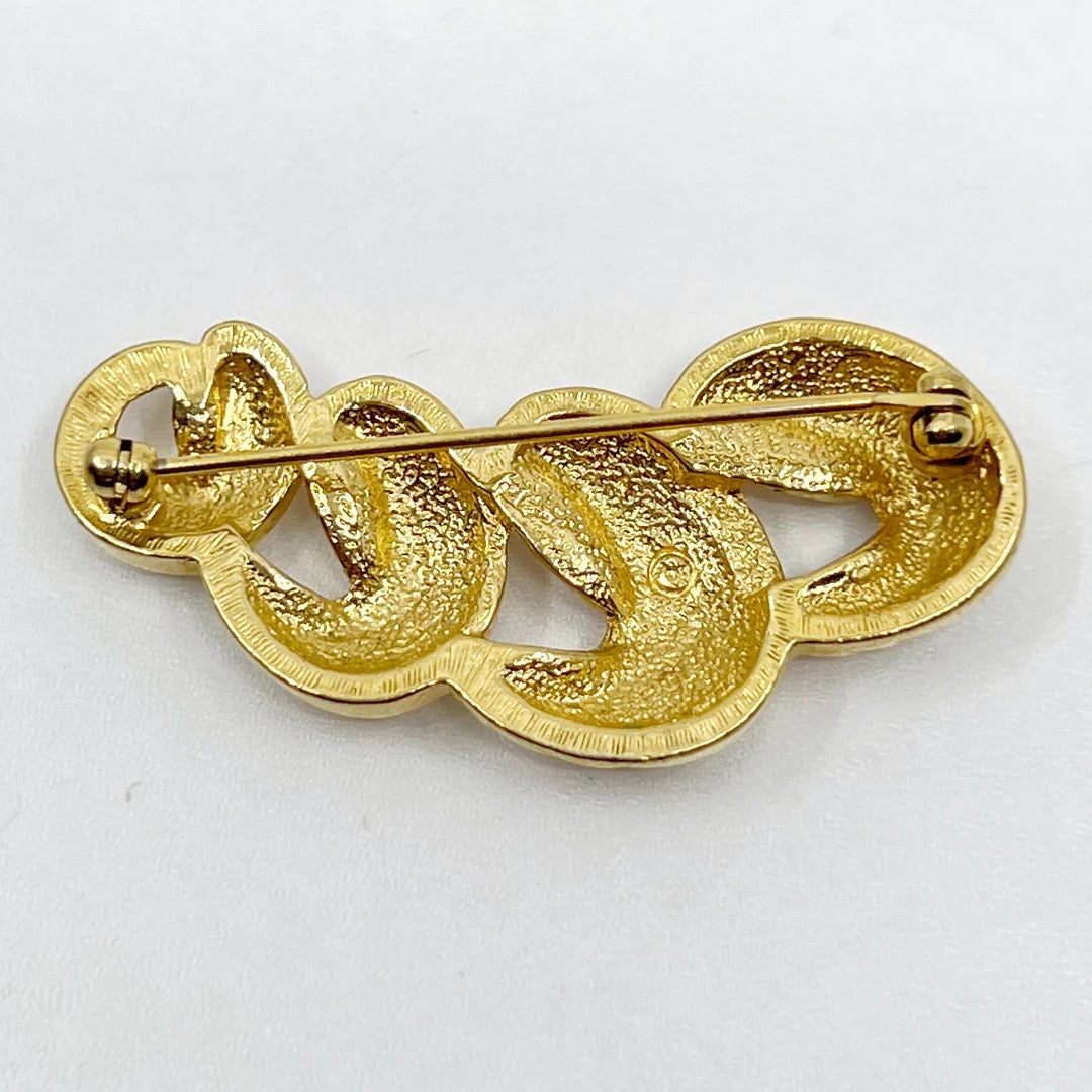 Vintage gold tone brooch