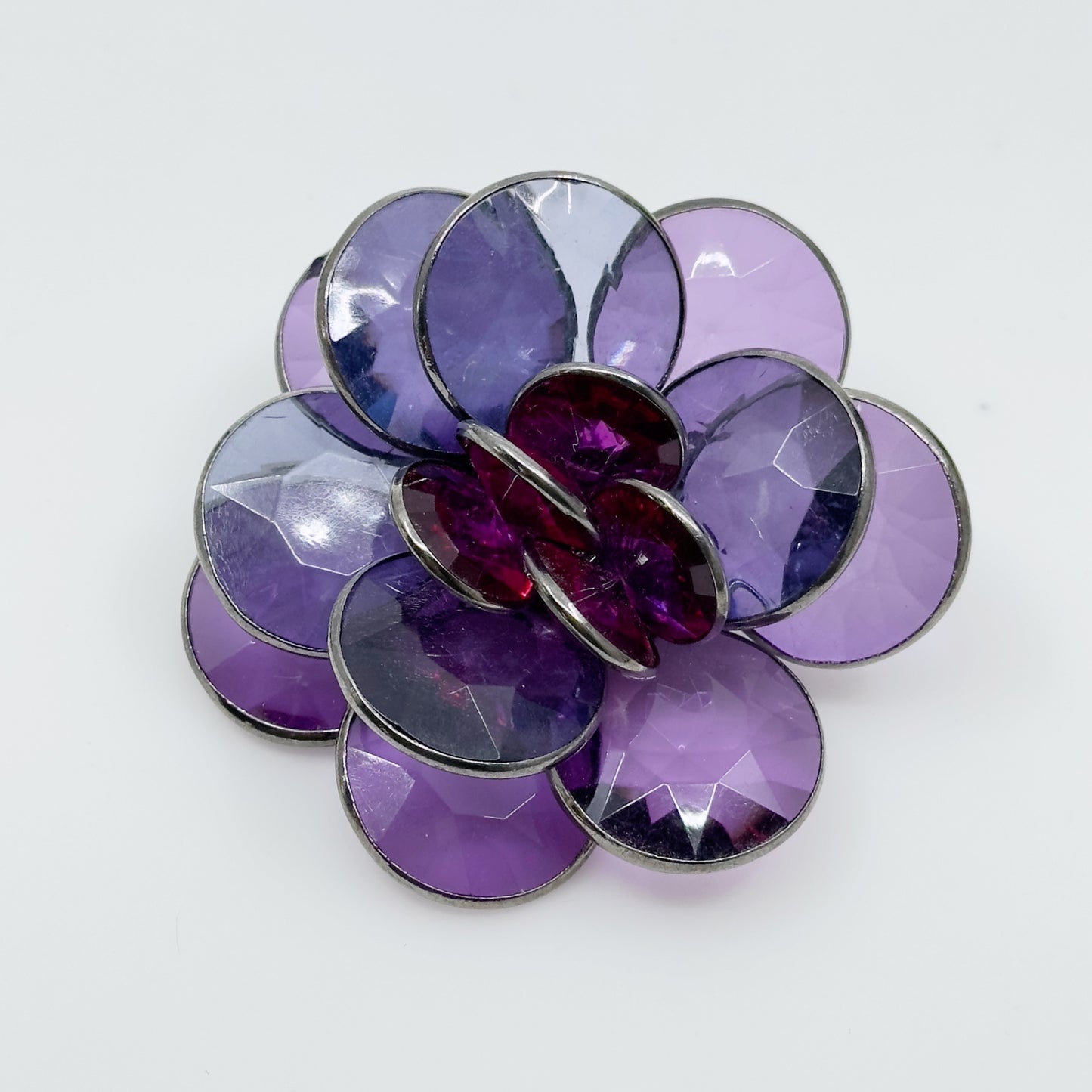 Blackened metal lucite petal brooch