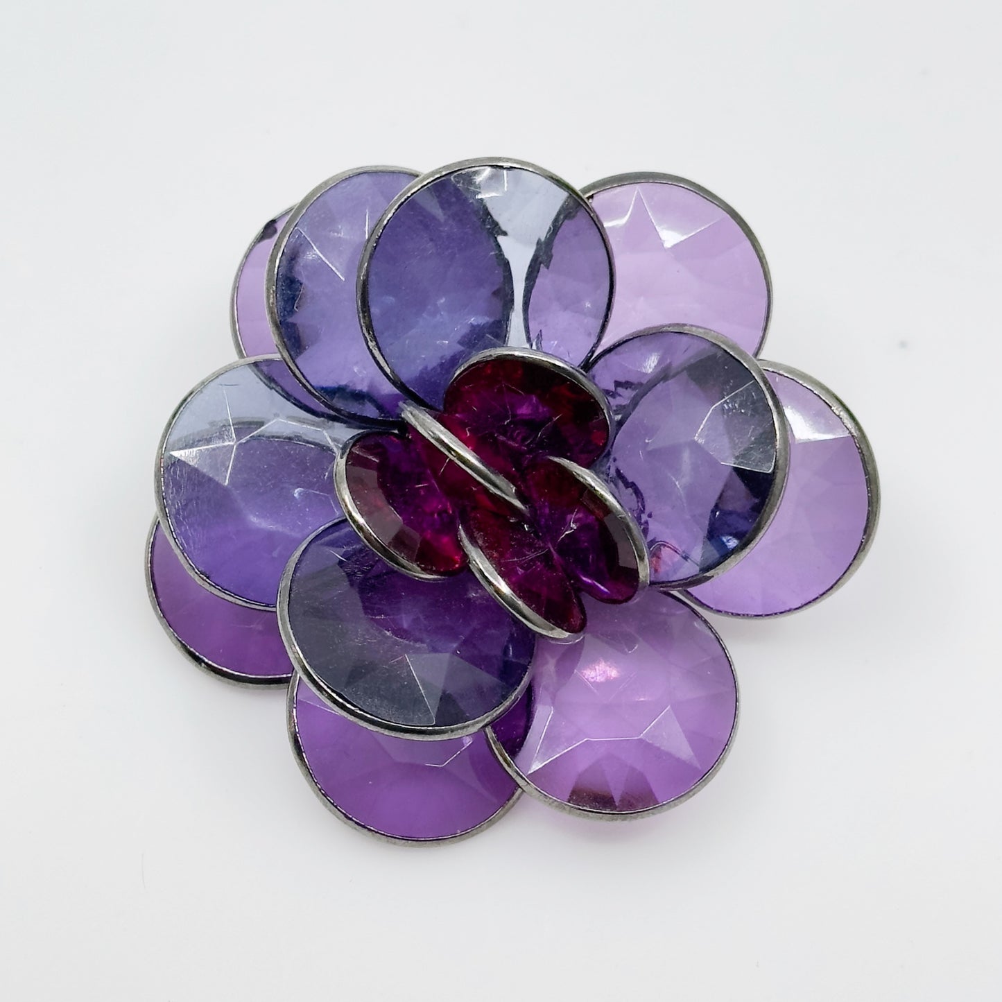 Blackened metal lucite petal brooch