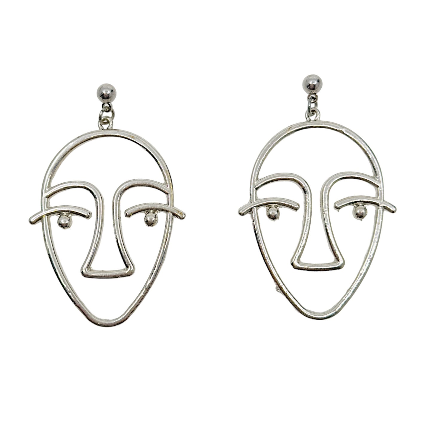 Silver tone face earrings