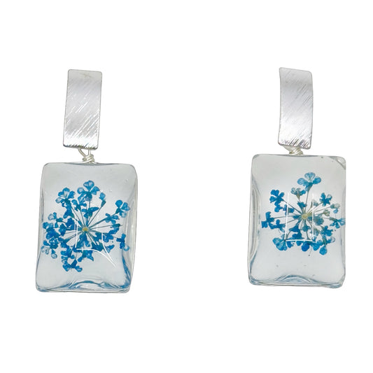 Silver tone flower acrylic earrings