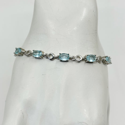 Silver Tone blue topaz tennis bracelet