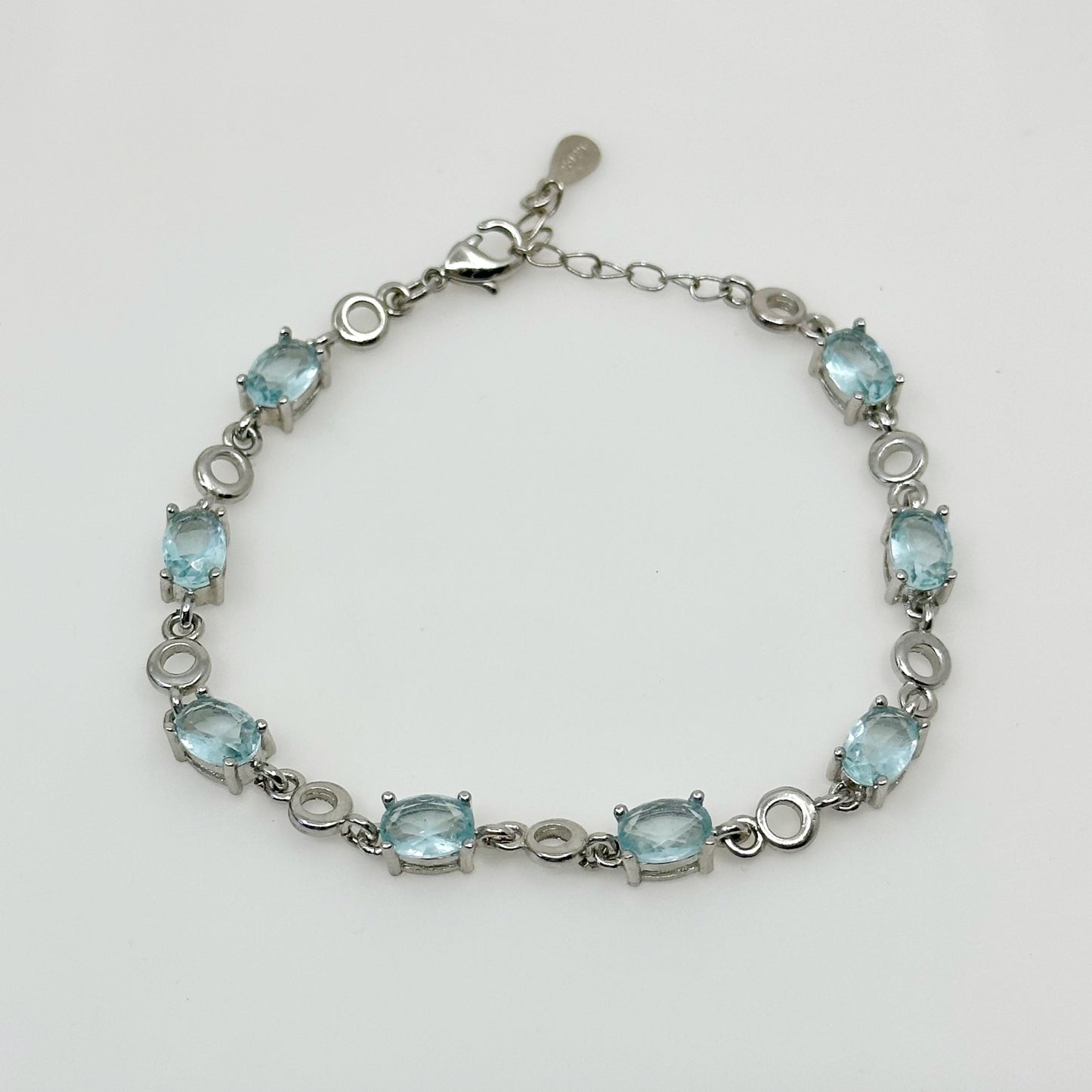 Silver Tone blue topaz tennis bracelet