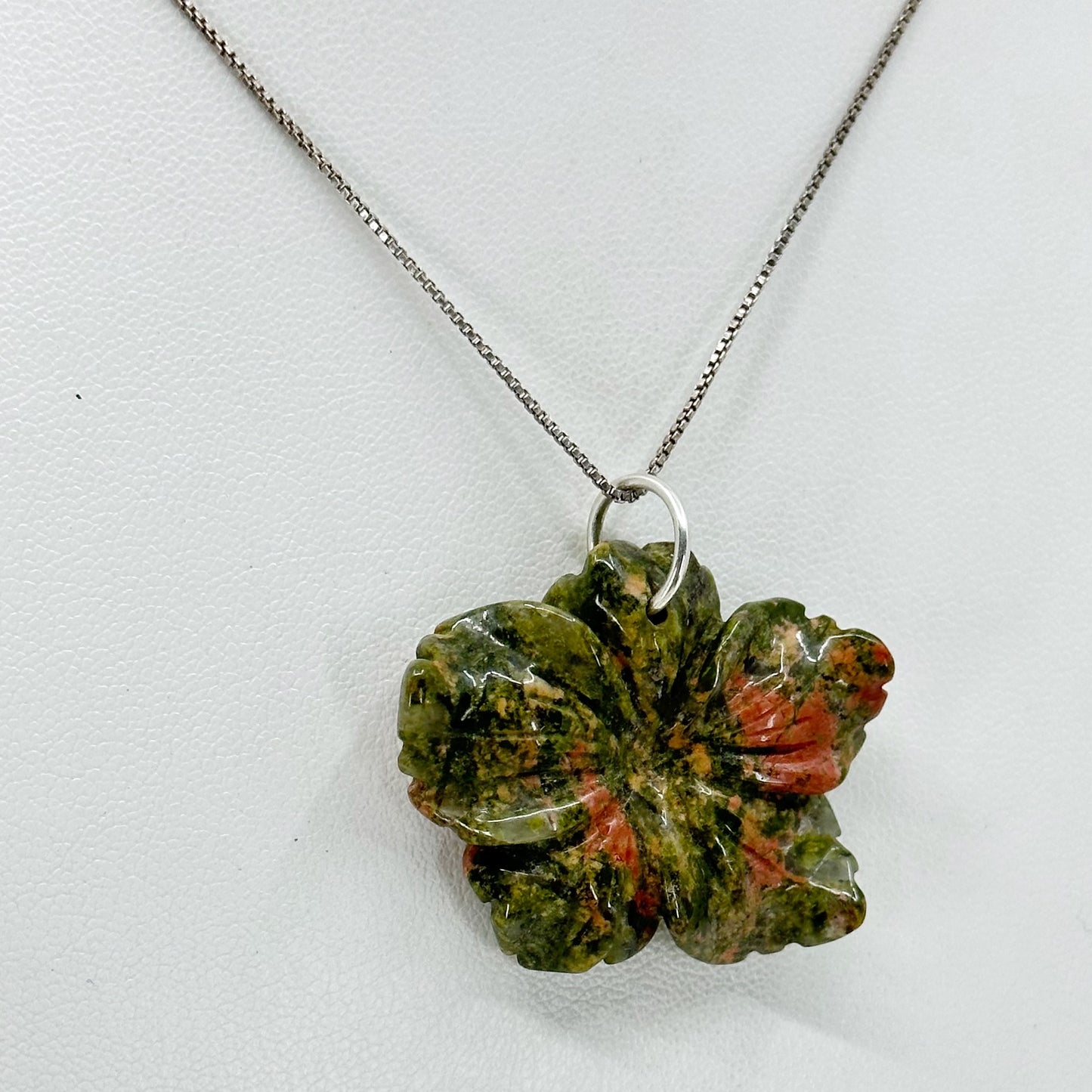 Sterling silver carved unakite flower pendant