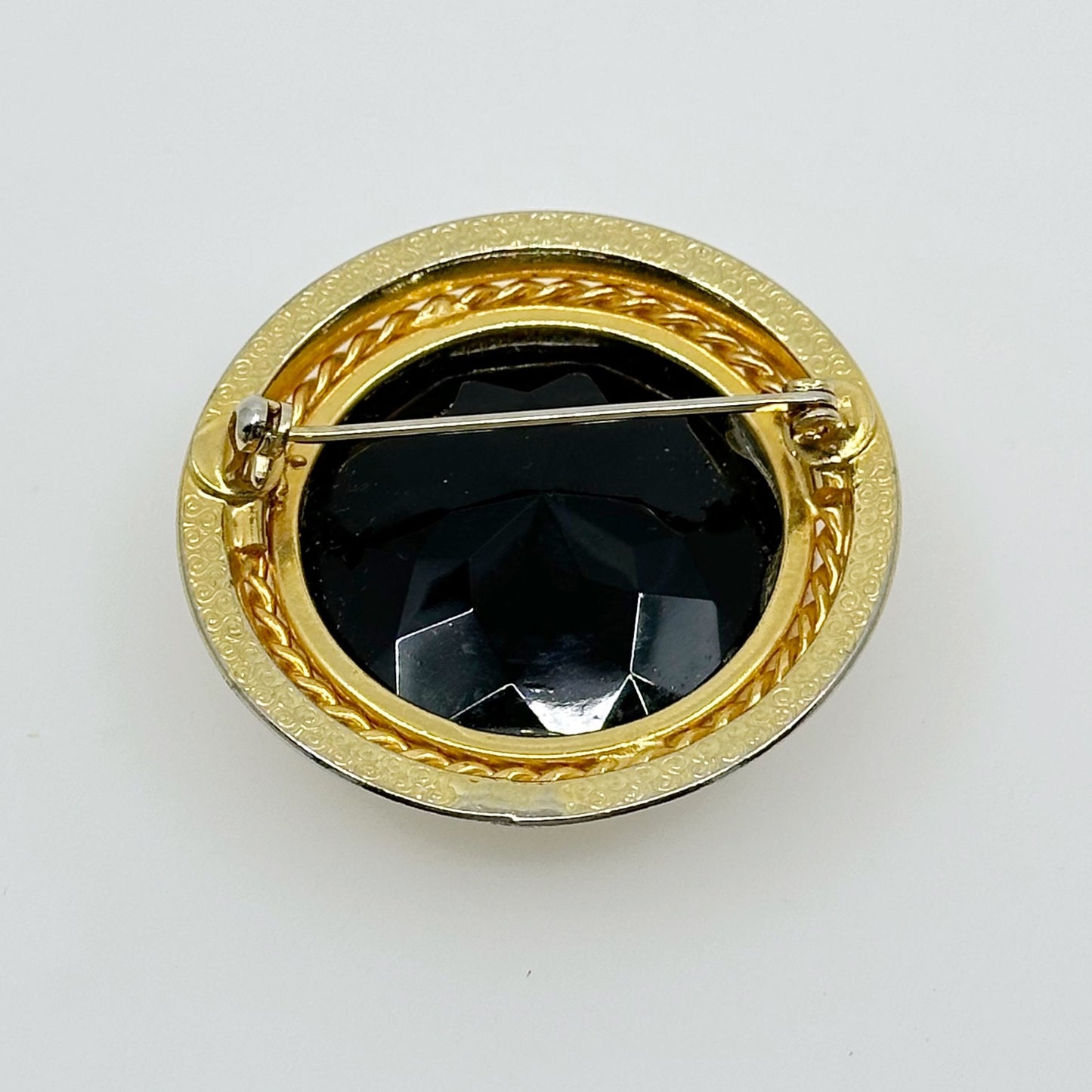 Vintage Gold tone black rhinestone brooch