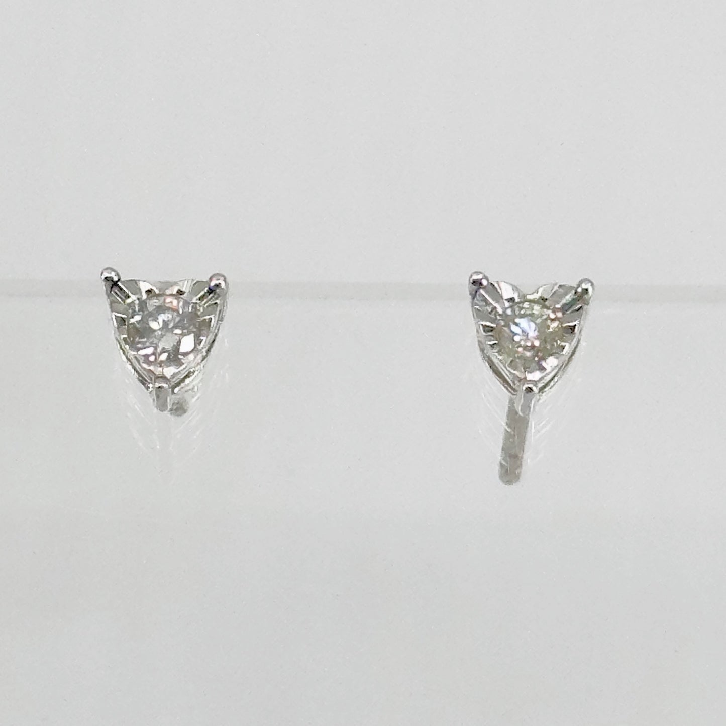 Sterling silver .06 carat diamond heart stud earrings