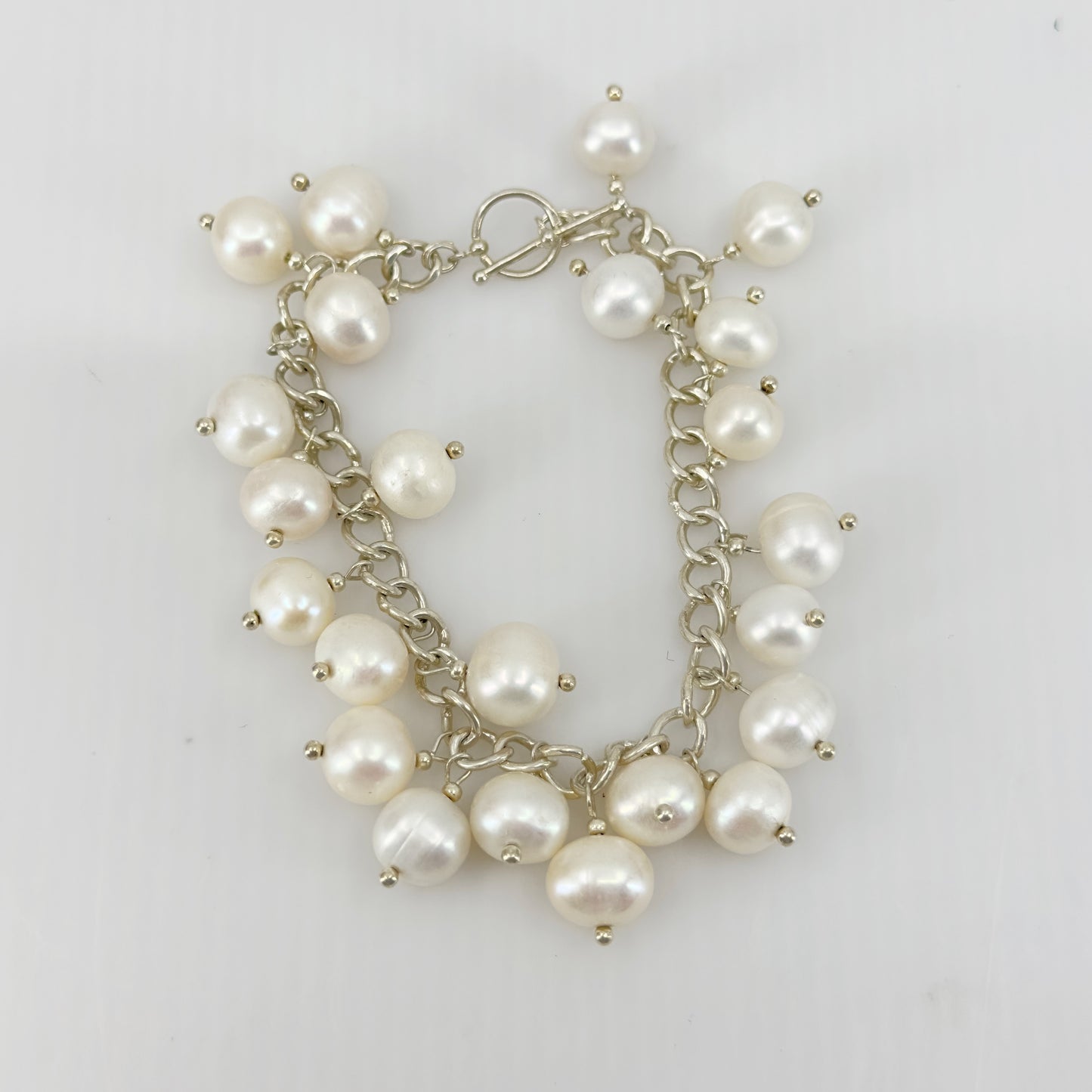 Hand Made sterling silver freshwater pearl charm bracelet