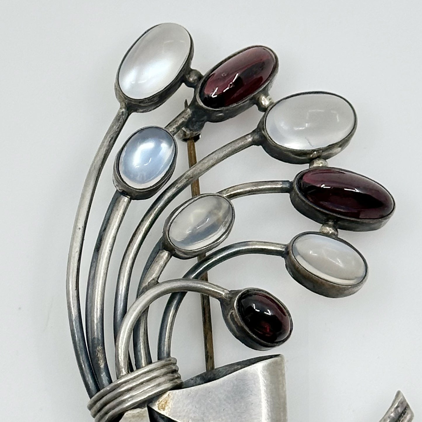 Art Nouveau sterling silver moonstone & garnet brooch