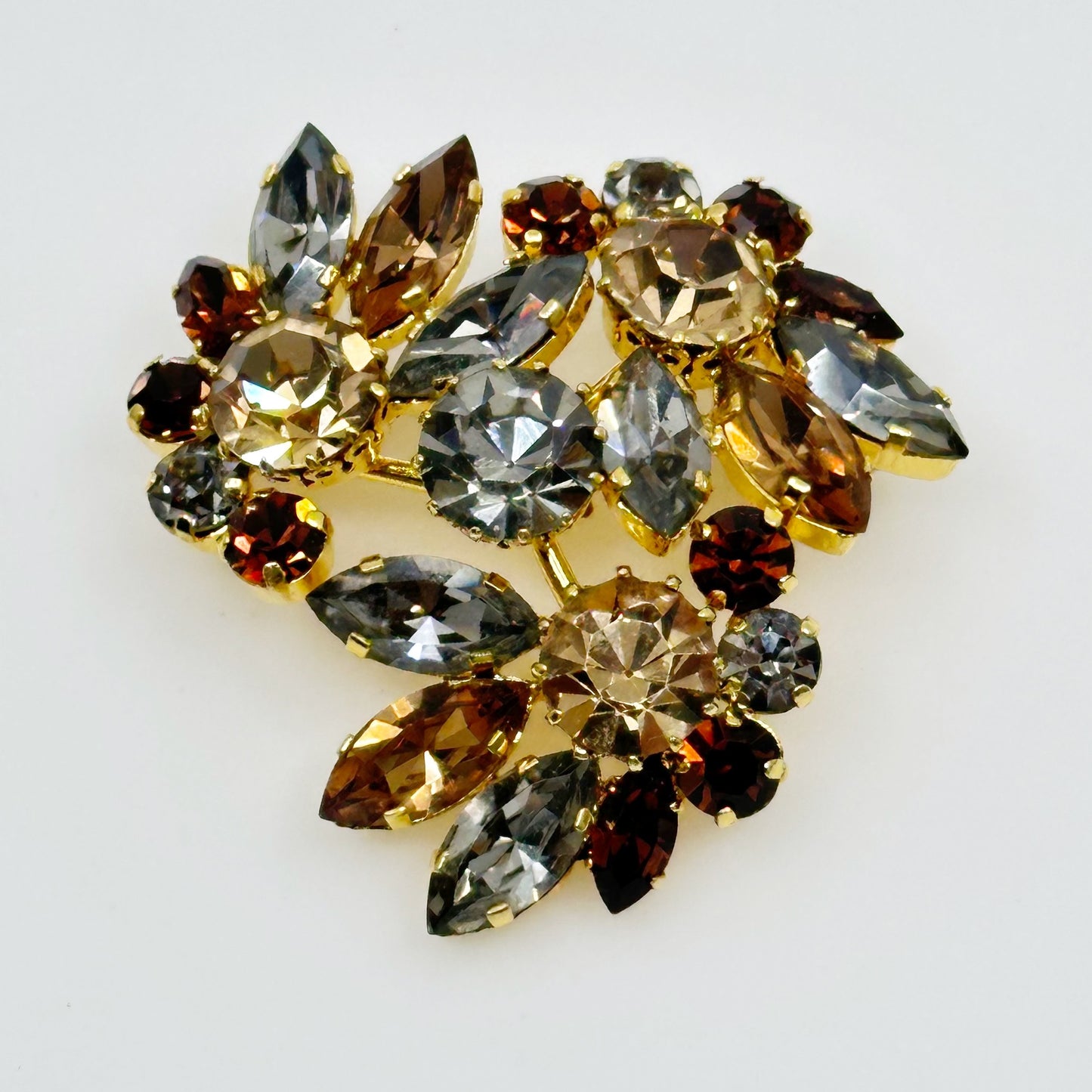 Vintage Austria Gold tone rhinestone brooch