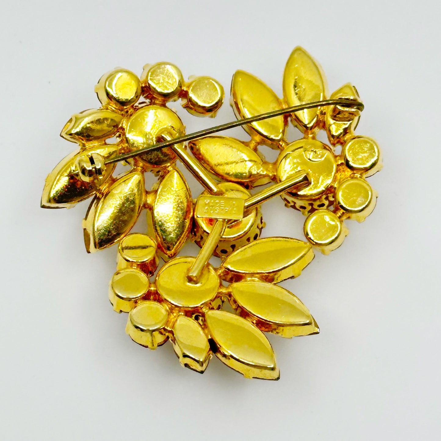 Vintage Austria Gold tone rhinestone brooch