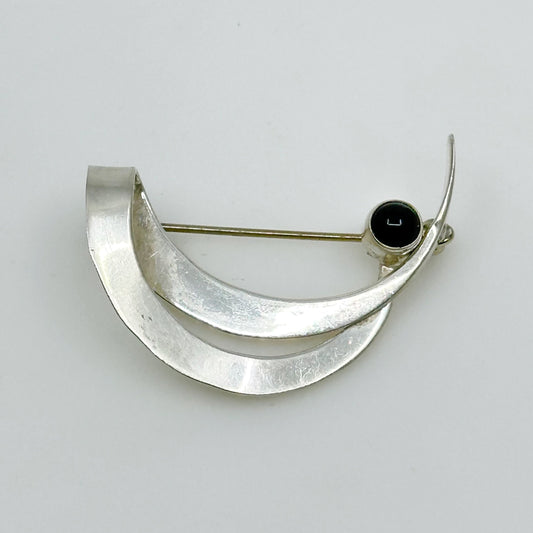 Modernist sterling silver onyx brooch