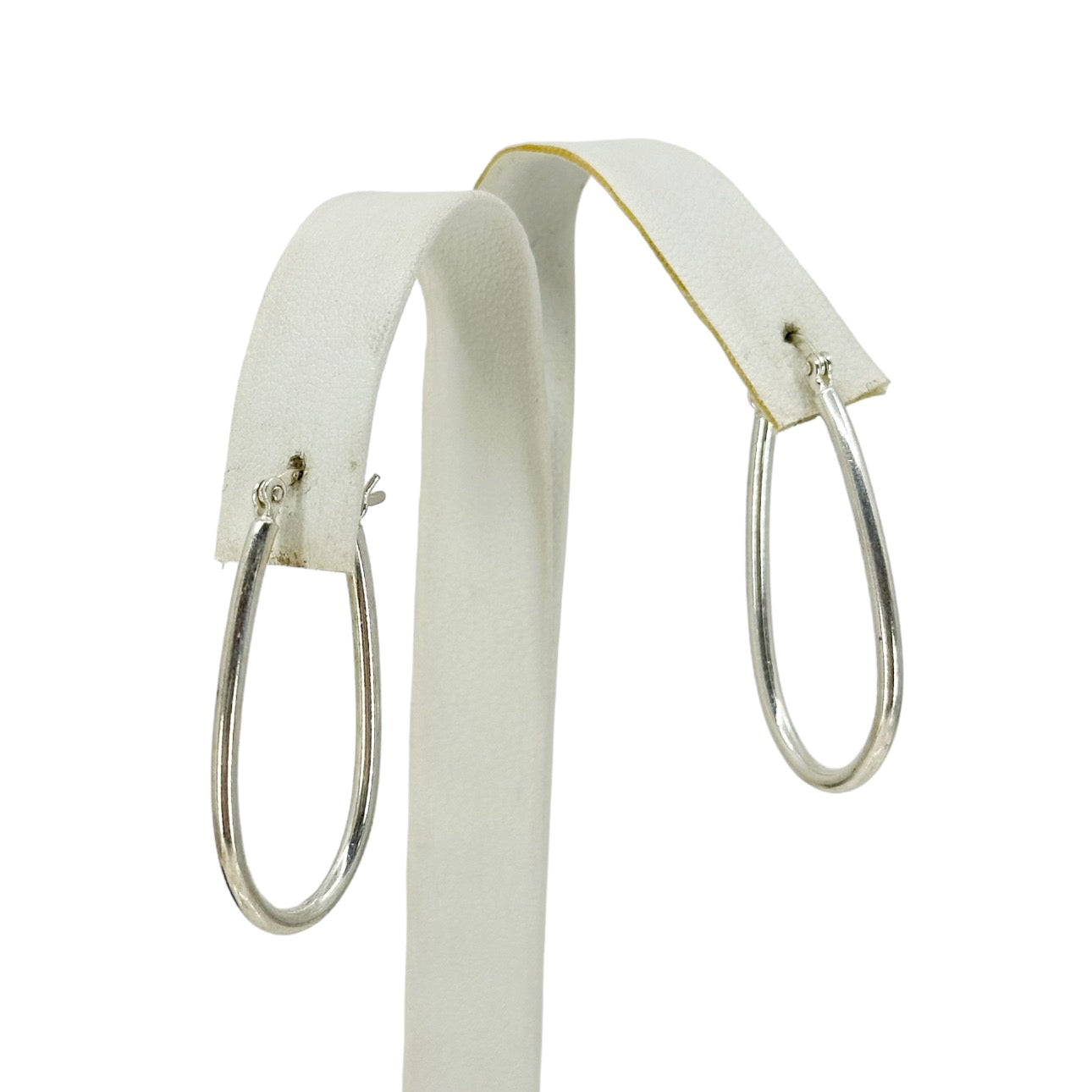 Sterling silver elongated hoop earrings