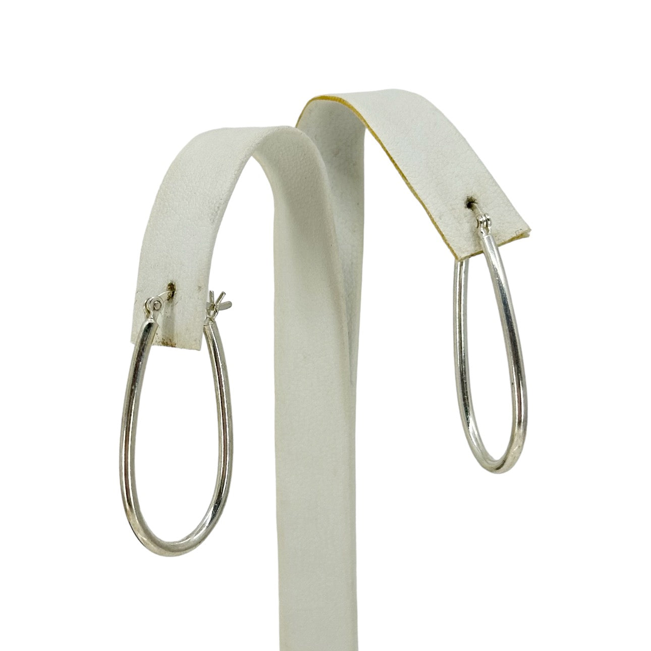 Sterling silver elongated hoop earrings