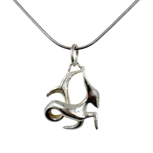Modernist sterling silver Capricorn pendant