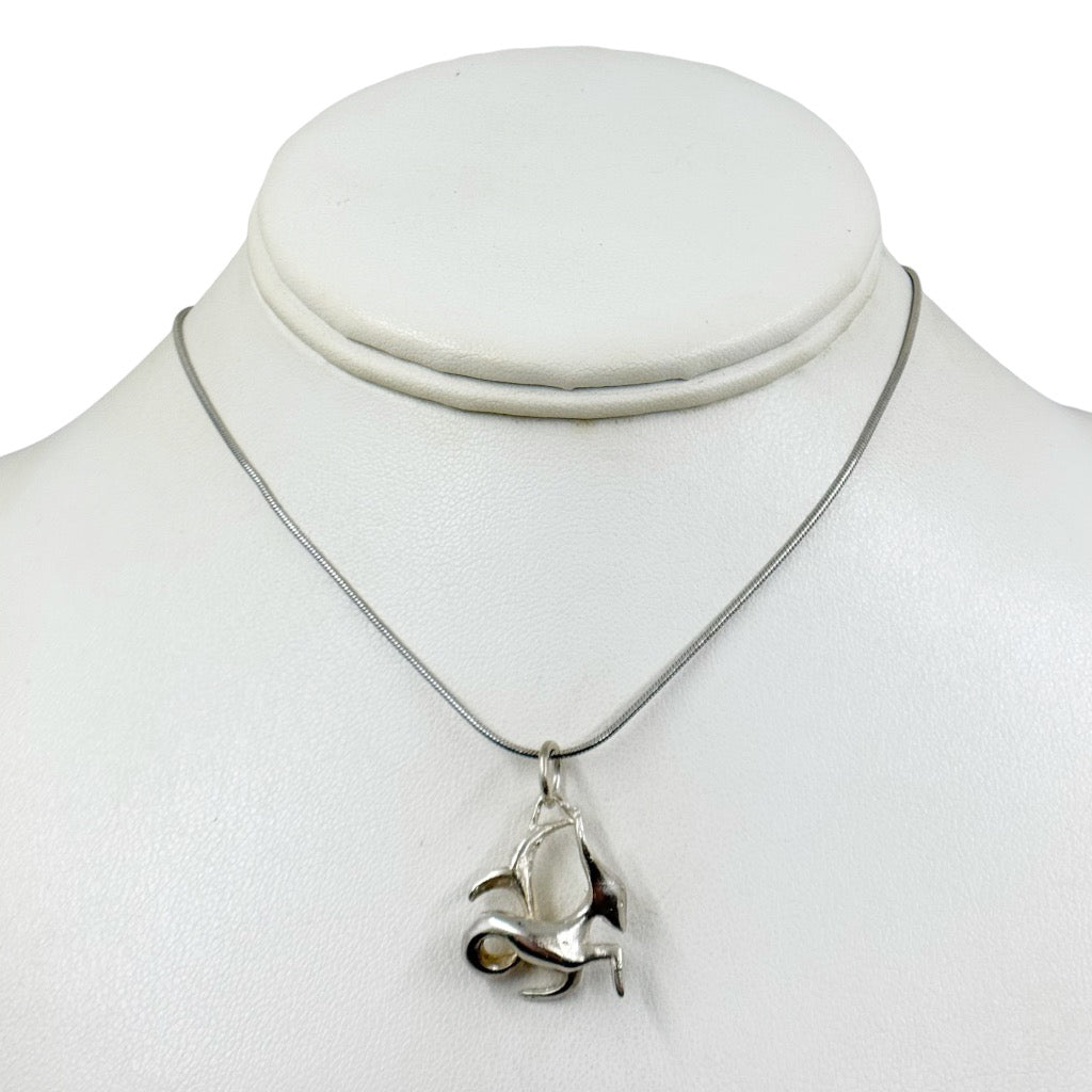 Modernist sterling silver Capricorn pendant