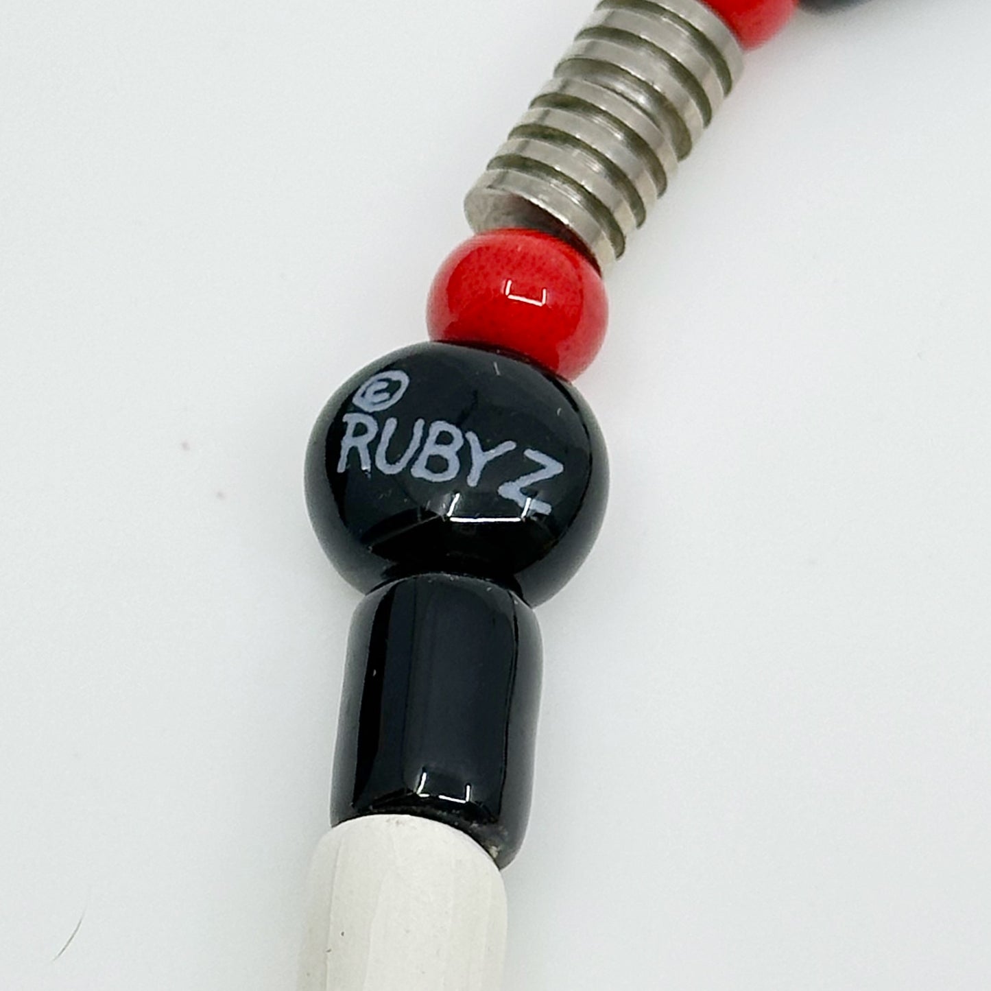 Ruby Z Candace Loheed ceramic boy pendant necklace