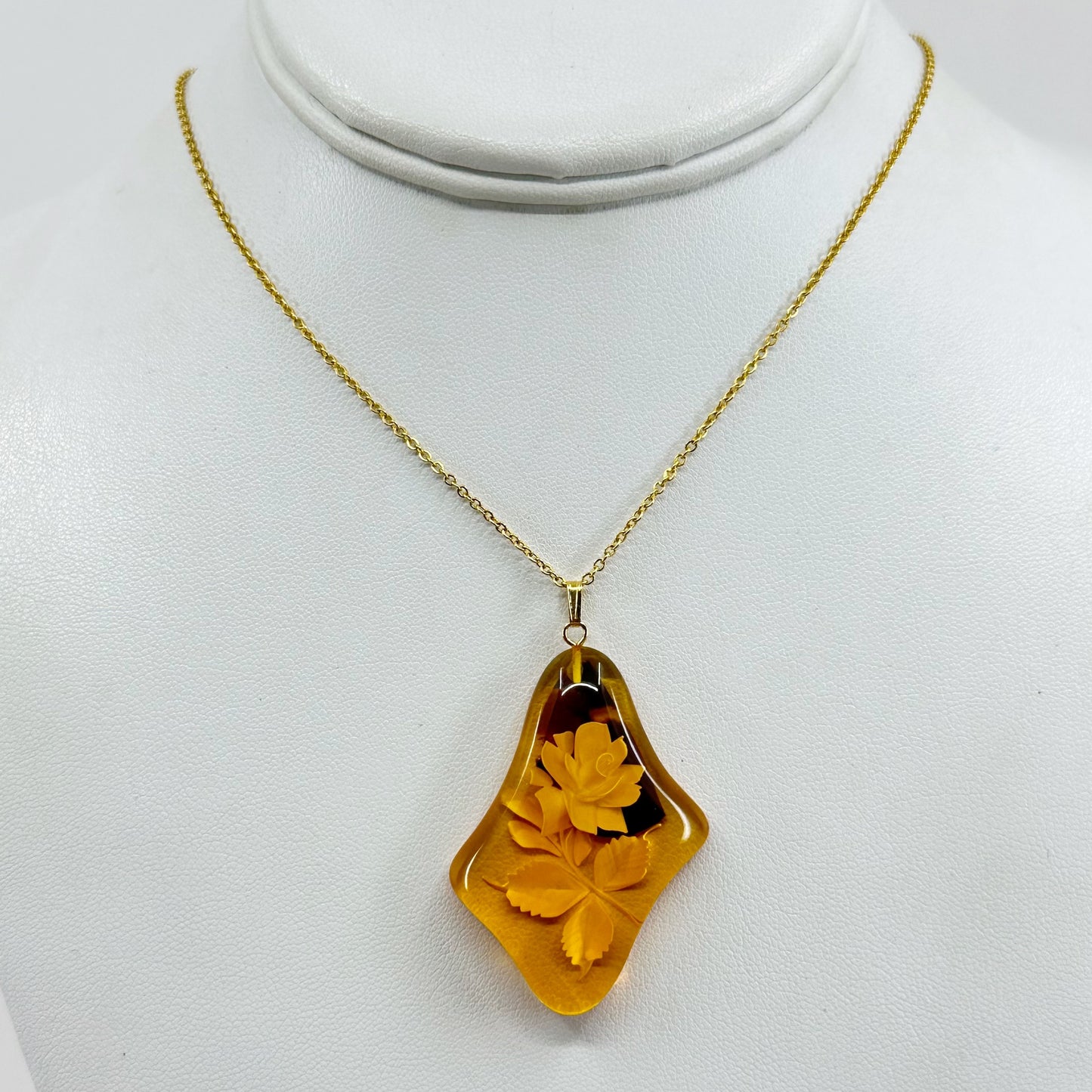 gold plated reverse carved rose baltic amber pendant necklace