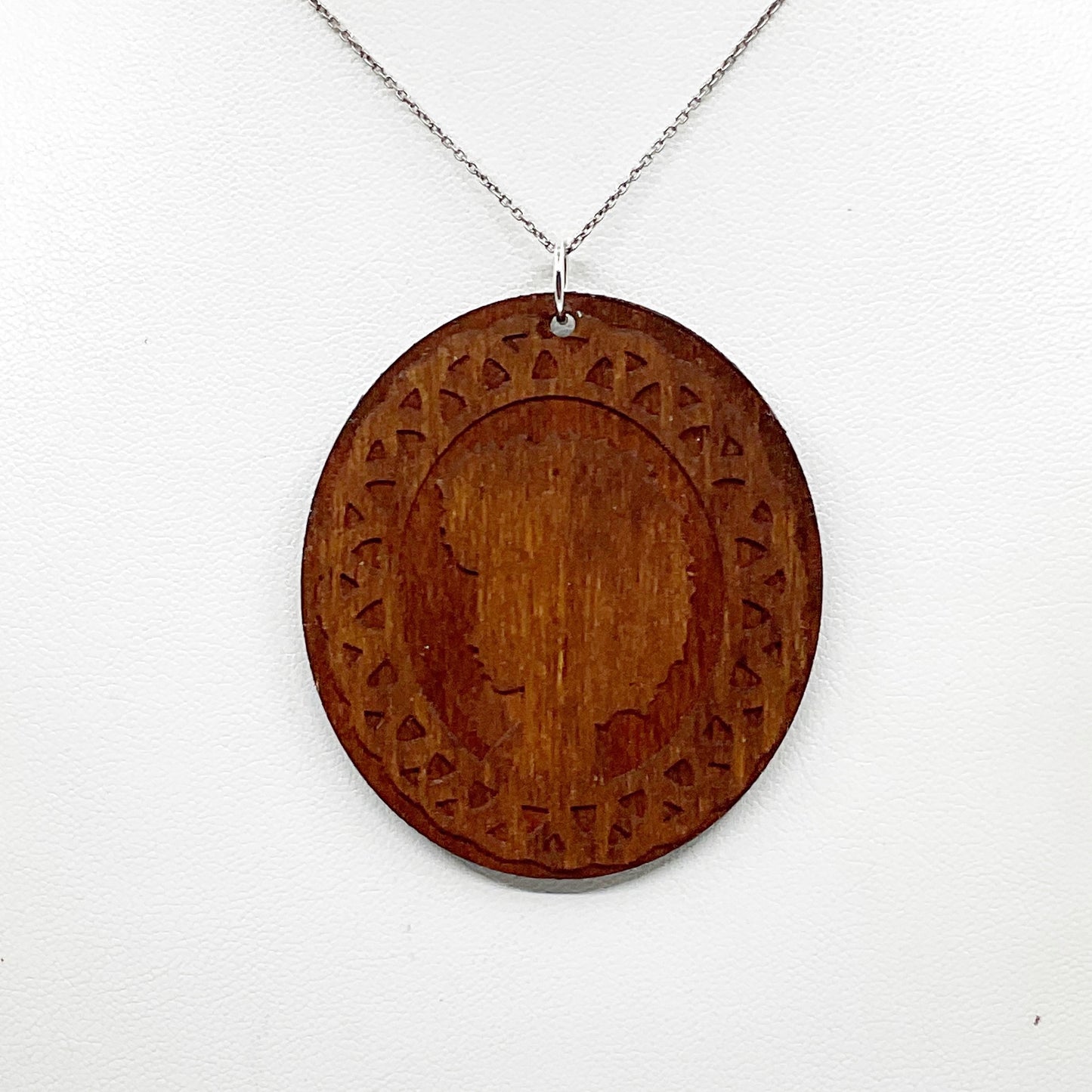 Sterling silver carved wood women profile pendant