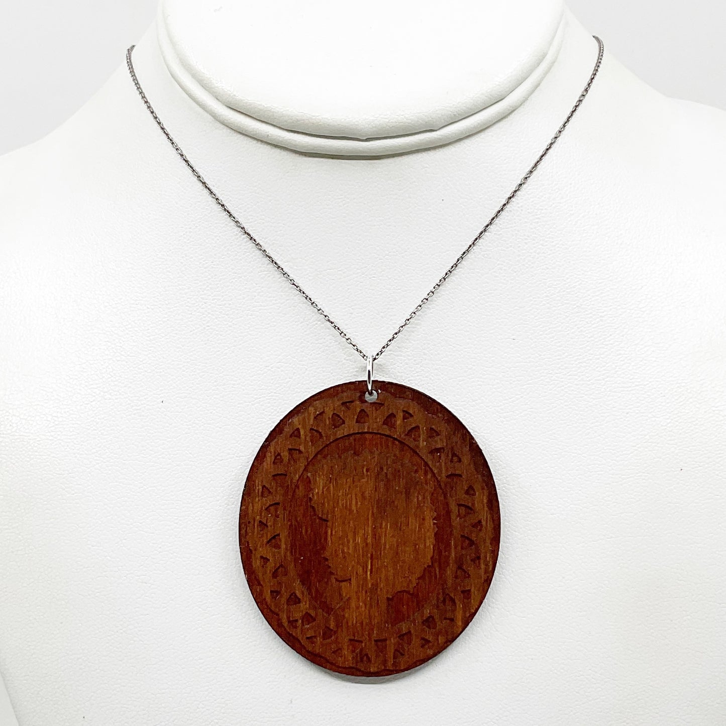 Sterling silver carved wood women profile pendant