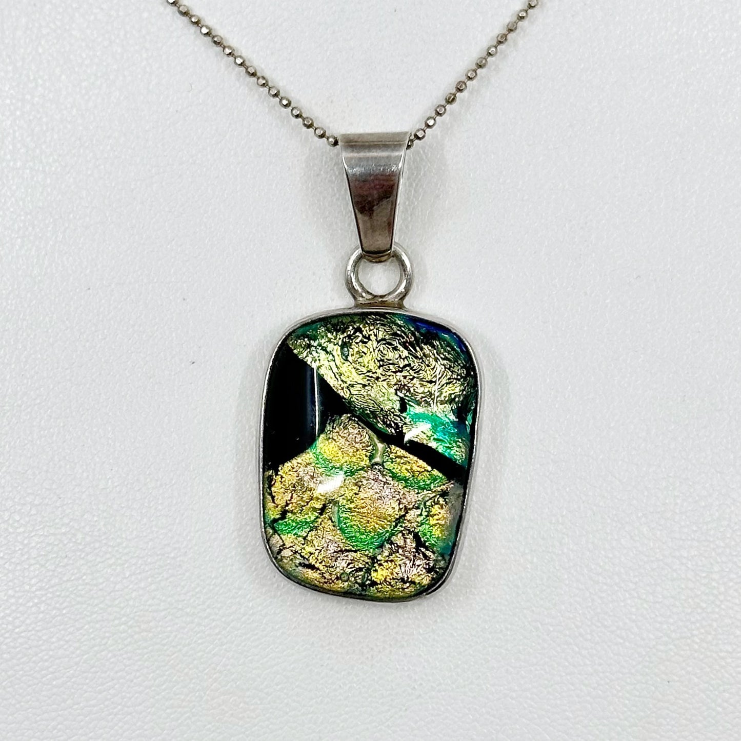 Sterling silver dichroic glass pendant