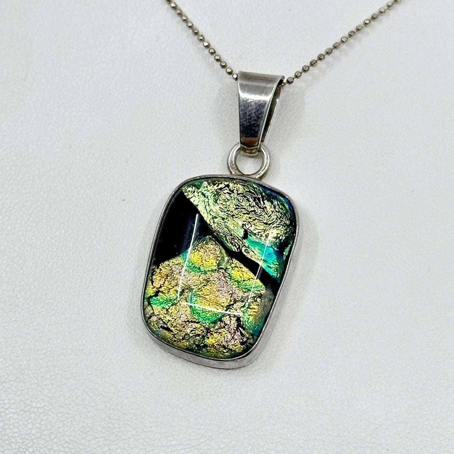 Sterling silver dichroic glass pendant